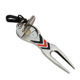 Golf divot repair tool lifting grass on golf course